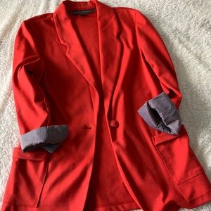 Adorable pink and red- ish blazer.